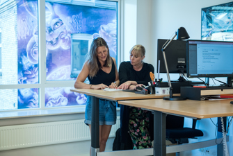 Kommunikationsfolk på arbejde